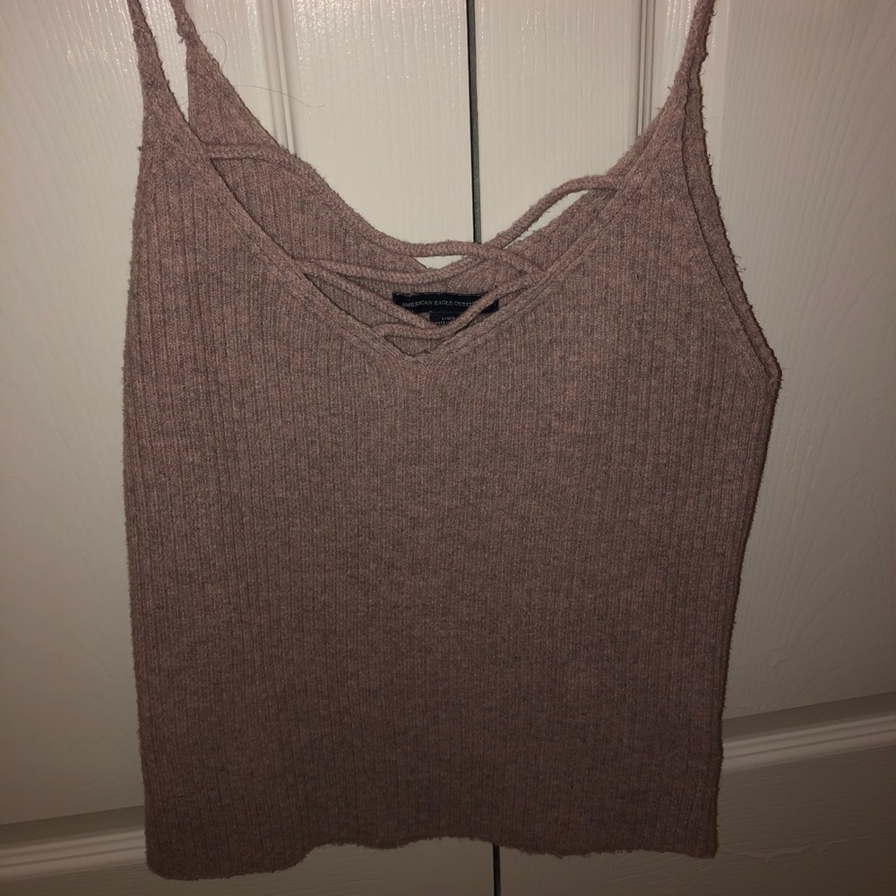 sweater/knit material light purple/brown colored